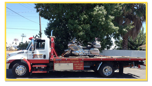 Light Duty Tow Truck flatbed with motorcycle