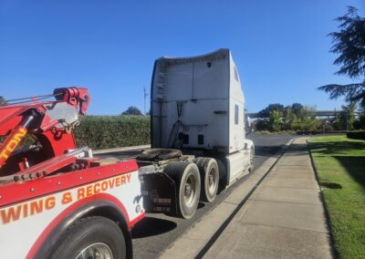 Heavy duty tow truck pulls 3 axle tractor