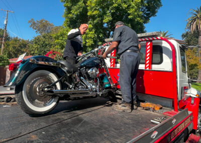 Harley Davidson on Flatbed Tow Truck