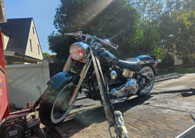 Harley Davidson on Flatbed Tow Truck